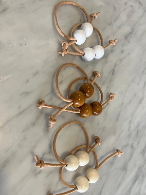 Servilletero doble con tiento de cuero